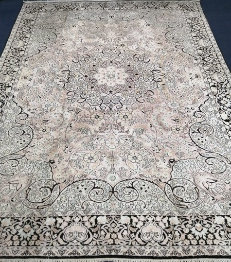 A silk carpet 295 x 205cm